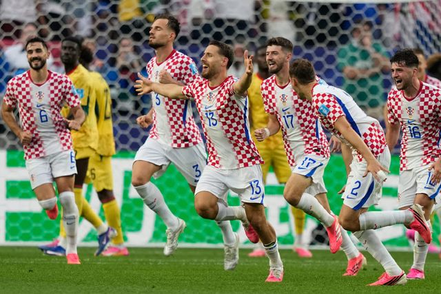 Croatia's Nikola Vlasic (13) celebrates with teammates after scoring his side's second goal during the World Cup Group L soccer match between Croatia and Ghana in Philadelphia, Saturday, June 27, 2026. (AP Photo/Matt Slocum)