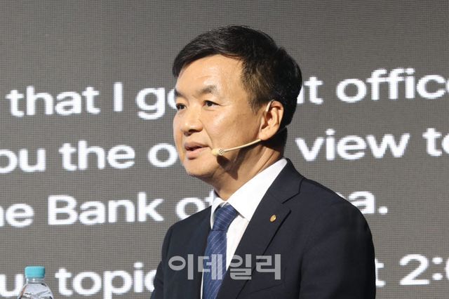 Jin-il Kim, Member of the Monetary Policy Board, Bank of Korea, delivers a presentation on the topic of