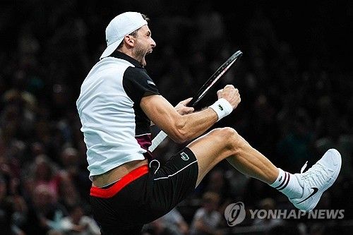 승리 후 기뻐하는 디미트로프