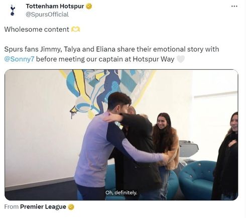 훈련장으로 초대한 팬과 포옹하는 손흥민