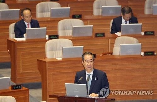 답변하는 한덕수 총리