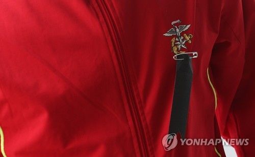 해병대 가슴에 달린 근조 리본