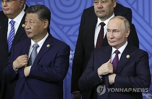 시진핑 중국 국가주석(좌)와 블라디미르 푸틴 러시아 대통령