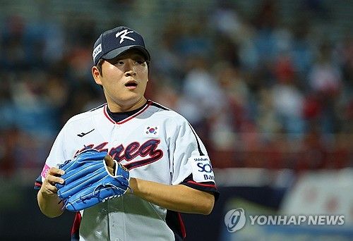 더그아웃 향하는 김택연