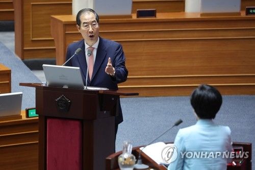 답변하는 한덕수 총리