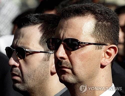 바샤르 알아사드 대통령(오른쪽)과 동생 마헤르 알아사드