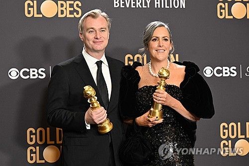 크리스토퍼 놀런 감독(왼쪽)과 배우자인 영화제작자 엠마 토머스