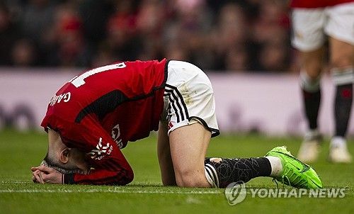 아쉬워하는 맨체스터 유나이티드의 공격수 가르차노