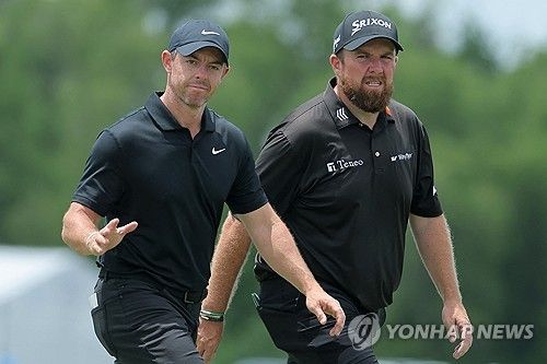 매킬로이(왼쪽)와 라우리