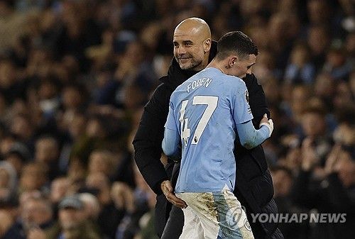 페프 과르디올라 감독과 필 포든