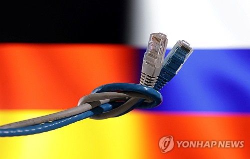 독일·러시아 해킹 논란(일러스트)