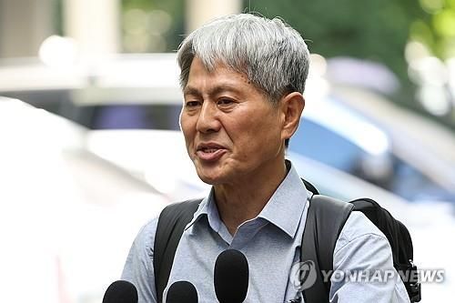 답변하는 신학림 전 언론노조위원장[연합뉴스 자료사진]