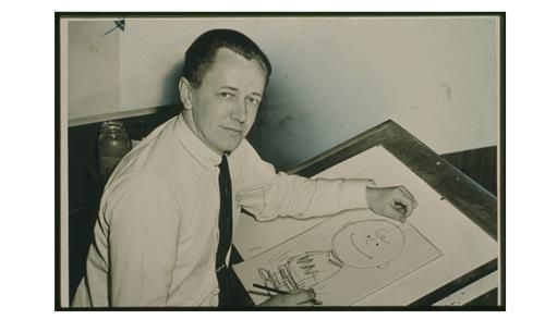 찰리 브라운 그림과 함께 있는 찰스 슐츠