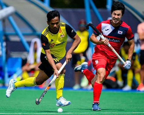 한국과 말레이시아의 경기 모습.