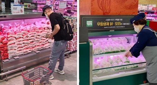 롯데마트(왼쪽)와 이마트의 초복 삼계탕용 영계 판매 코너