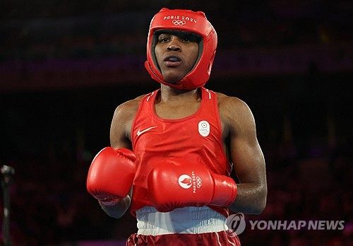 난민팀 역사상 첫 메달을 딴 여자 복싱 선수 신디 은감바