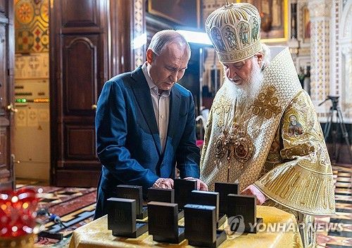 정교회 성탄절에 만난 푸틴 대통령과 키릴 대주교