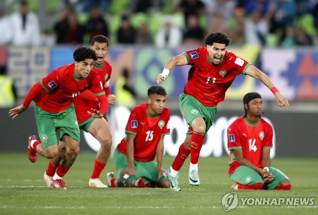 승부차기에서 승리가 확정되자 기뻐하는 모로코 선수들.