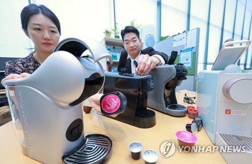 커피 캡슐과 커피 머신. [연합뉴스 자료사진]
