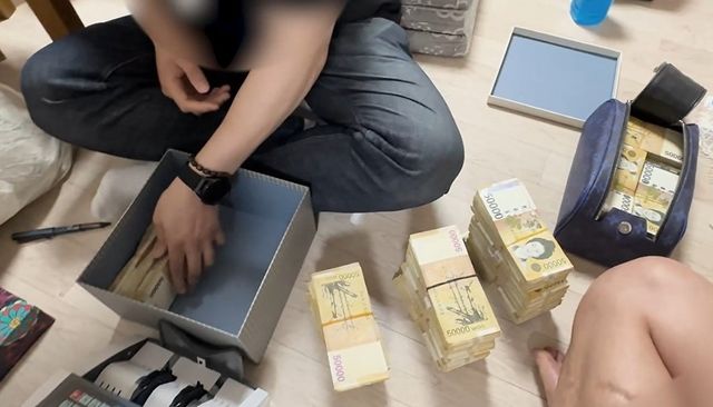 투자리딩방 총책 주거지서 나온 현금