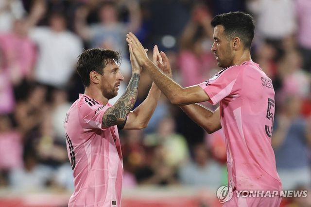 리오넬 메시와 세르히오 부스케츠