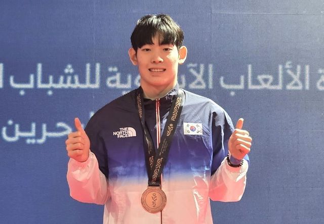 남자 평영 100ｍ에서 동메달을 딴 현준.