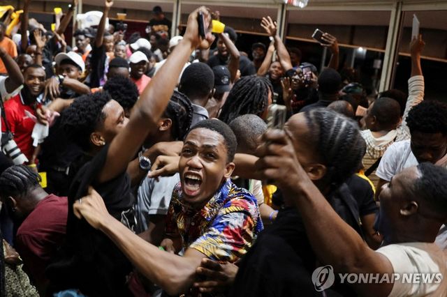 18일(현지시간) 월드컵 본선 진출에 환호하는 아이티 주민들