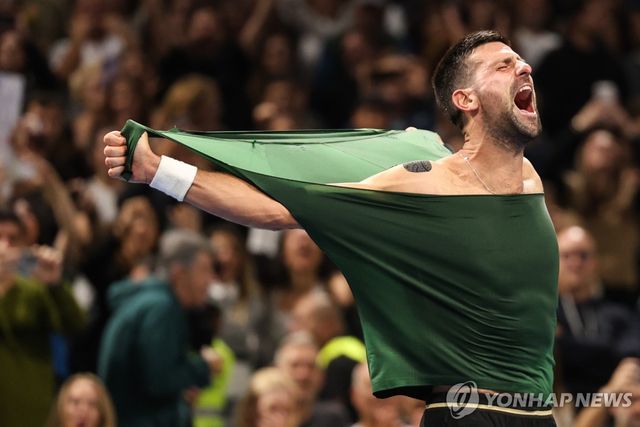 우승 확정 후 기뻐하는 조코비치