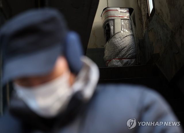 이불로 감싼 정수기