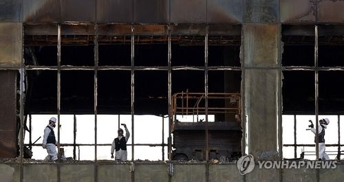 '부산 반얀트리 호텔 공사장 화재 원인을 찾아라'