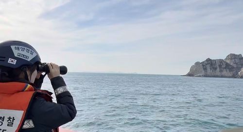 해상 수색하는 해경