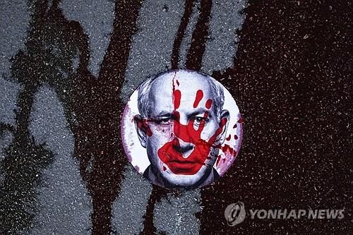 네타냐후 총리 얼굴 그려진 스티커