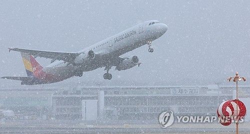 눈보라 뚫고 이륙