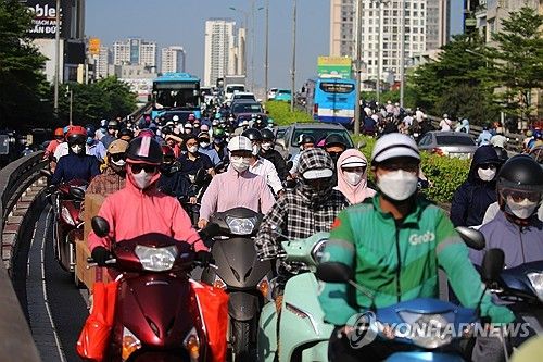 하노이 도로를 가득 메운 오토바이 행렬