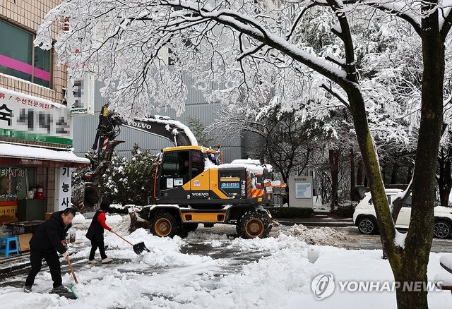 힘을 합해 제설