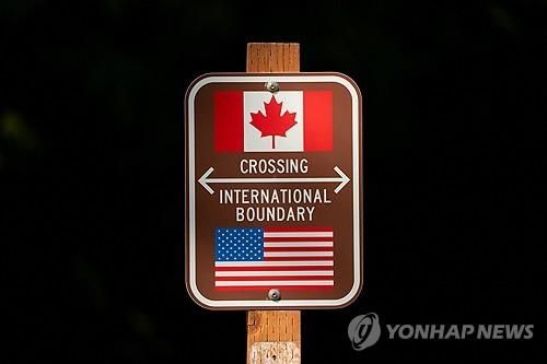 캐나다-미국 국경 검문소 팻말