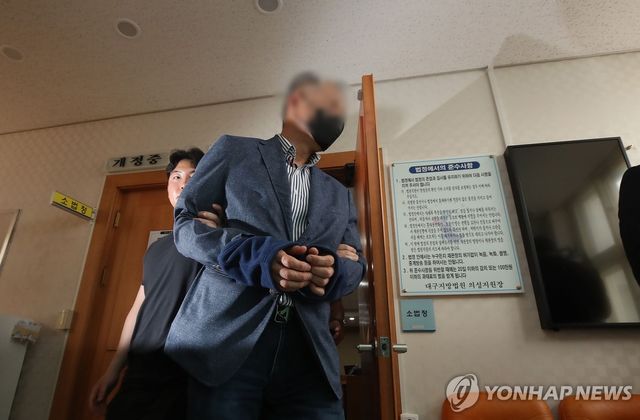 영장실질심사 마친 '경북 산불' 실화 혐의 성묘객