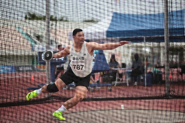 김일현, 남자 원반던지기 우승