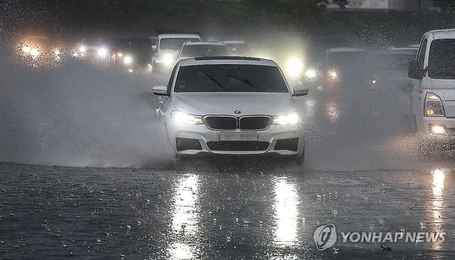 장대비 뚫고 퇴근