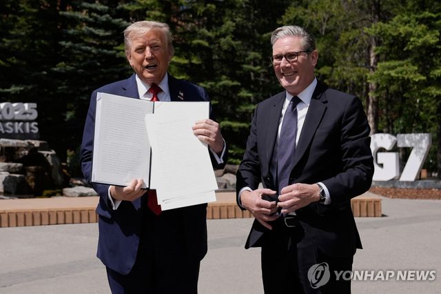 캐나다 G7서 무역협정 서명한 미·영 정상