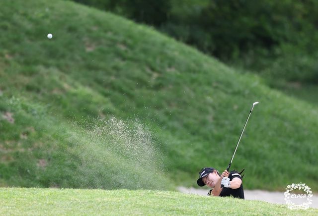 고지우, 14번 홀 벙커샷