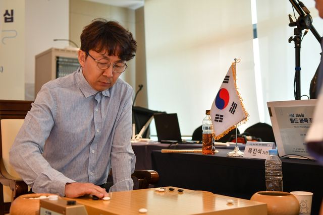 월드바둑 챔피언십에서 우승한 목진석 9단