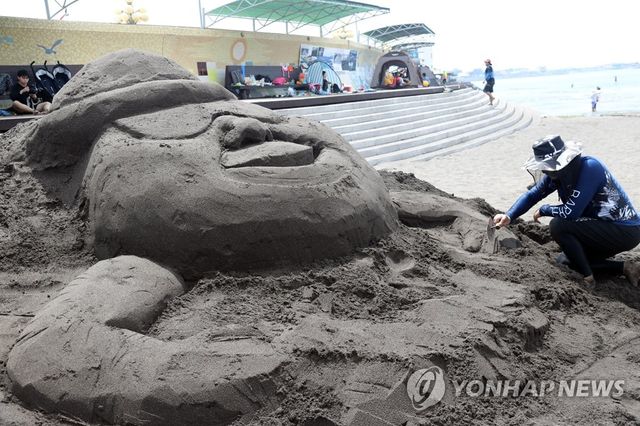 '검은모래 돌하르방 보러오세요'