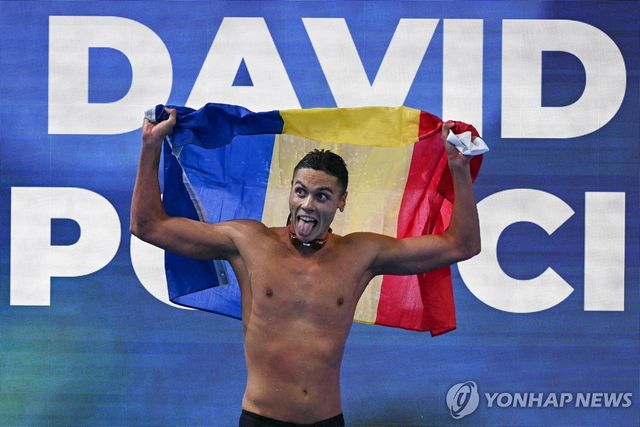 금메달을 딴 다비드 포포비치의 세리머니 모습.