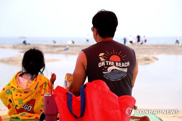 무더위 피해 바다로