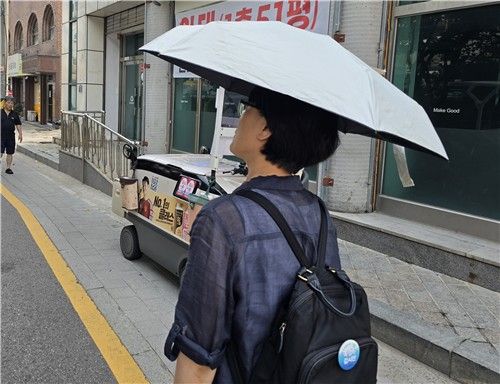 폭염 속 아이들의 집으로 가는 학습지 교사 정난숙 씨