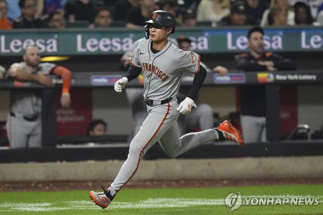 7회 득점하는 이정후