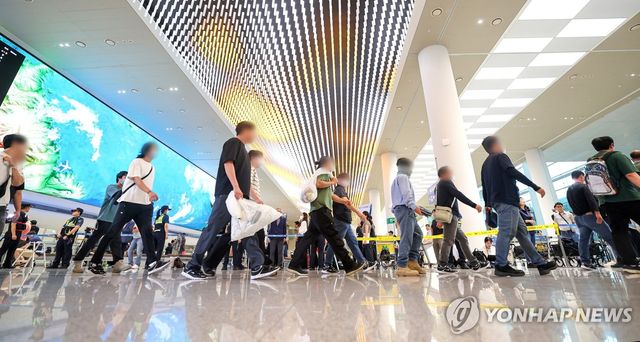 한국인 근로자들, 미국서 귀국