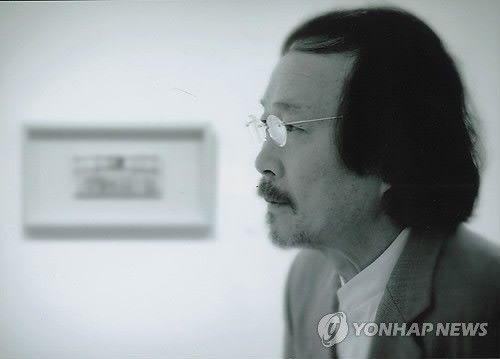 이타미 준(사진·한국명 유동룡)