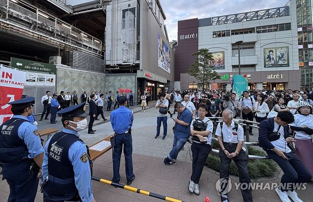 자민당 총재 선거 연설회 보는 사람들